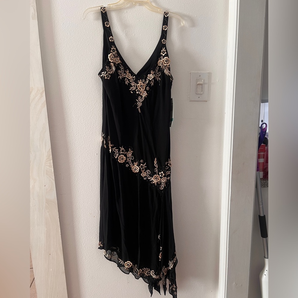 Chic Black Dress with Gold Floral Accents
